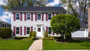 Two-story house with white siding