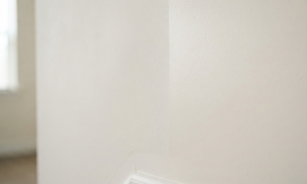 white interior wall showing two distinct sheen finishes